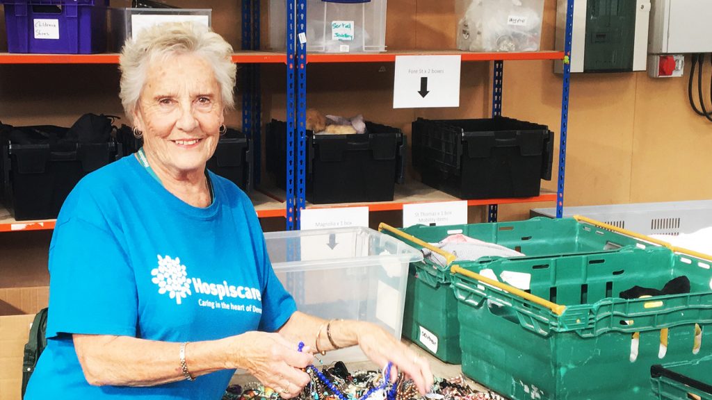 Hospiscare volunteer Di sorting jewellery