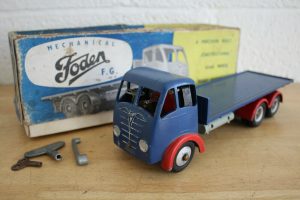 A vintage toy lorry and box