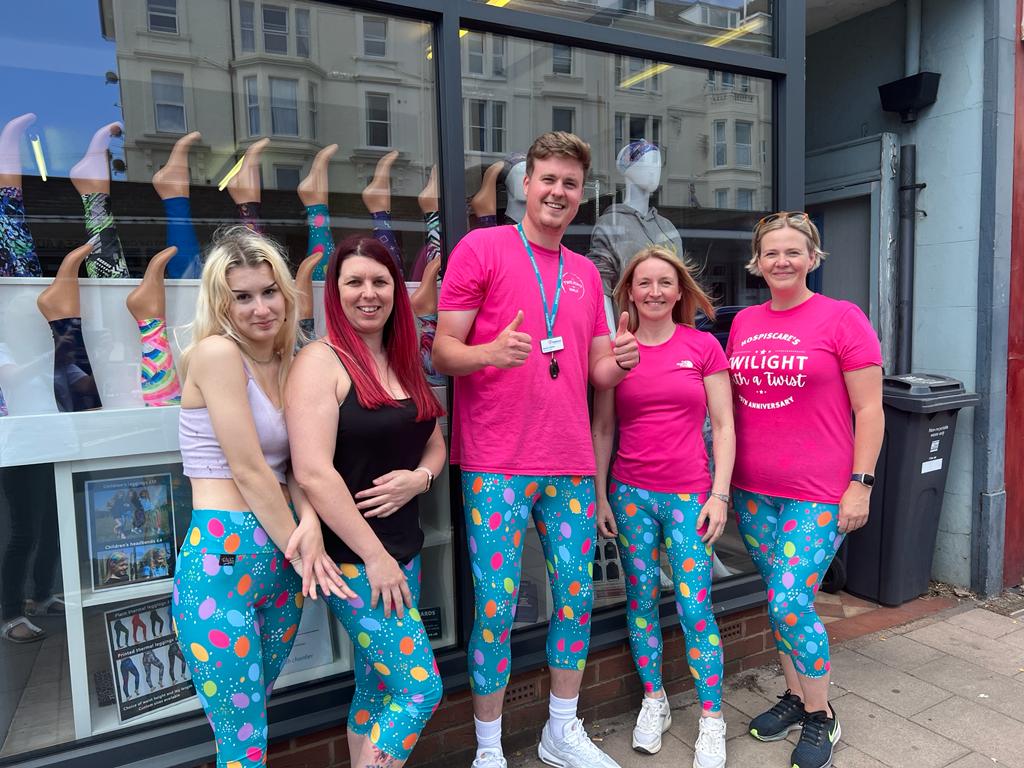 A group of people wearing Twilight t-shirts and Hospiscare leggings