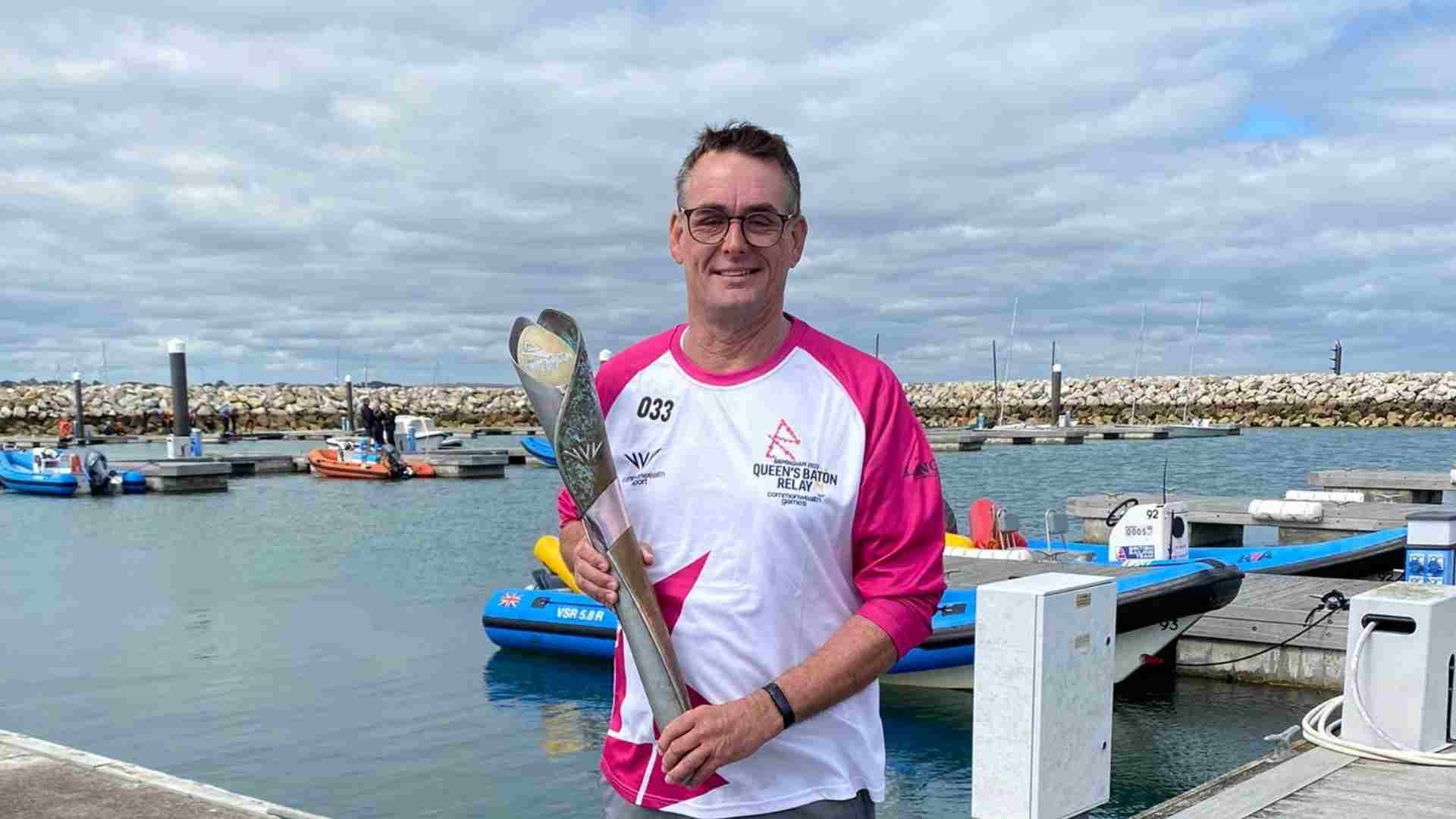 Steve carries the Commonwealth Games Baton!