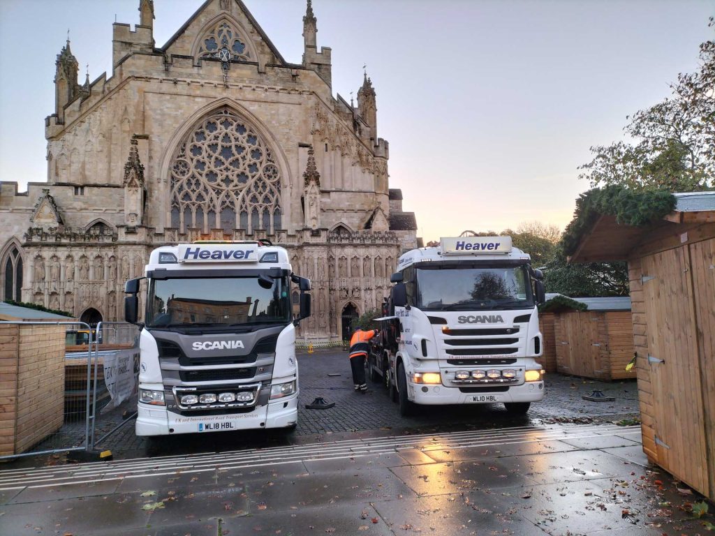 Two lorries in front of Exeter Cathedral