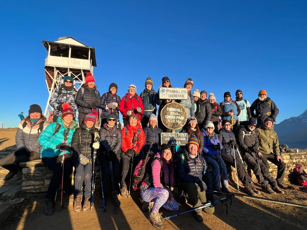 A group of trekkers at the top of Poon Hill, Nepal